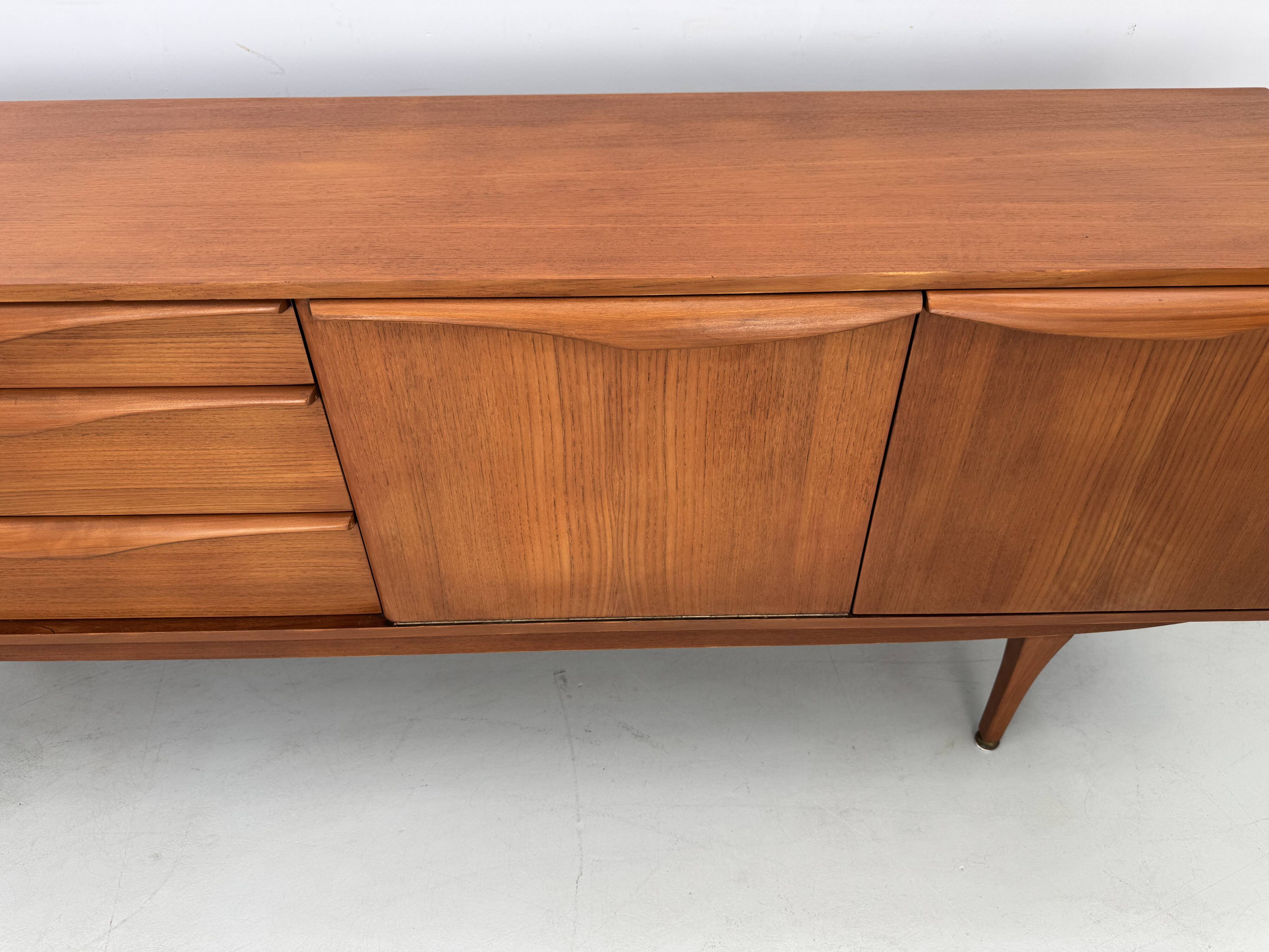 Beautiful and unique Stonehill sideboard from the 1960s made of teak wood.