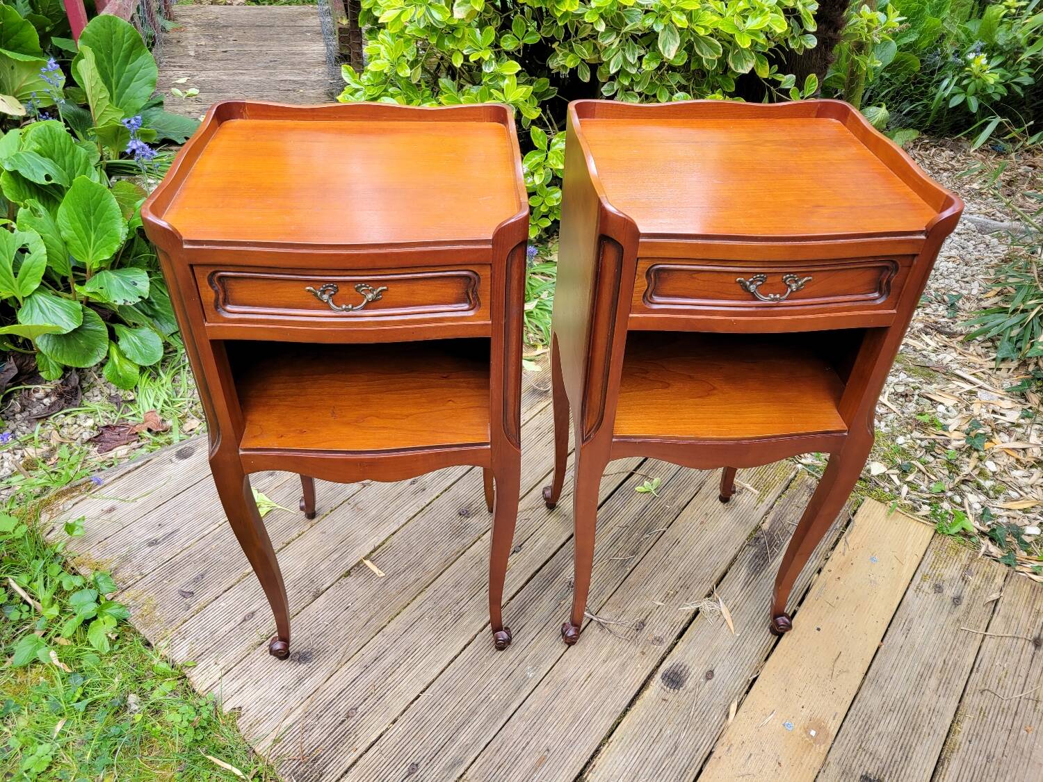 Pair of Louis XV bedside tables in cherry wood.