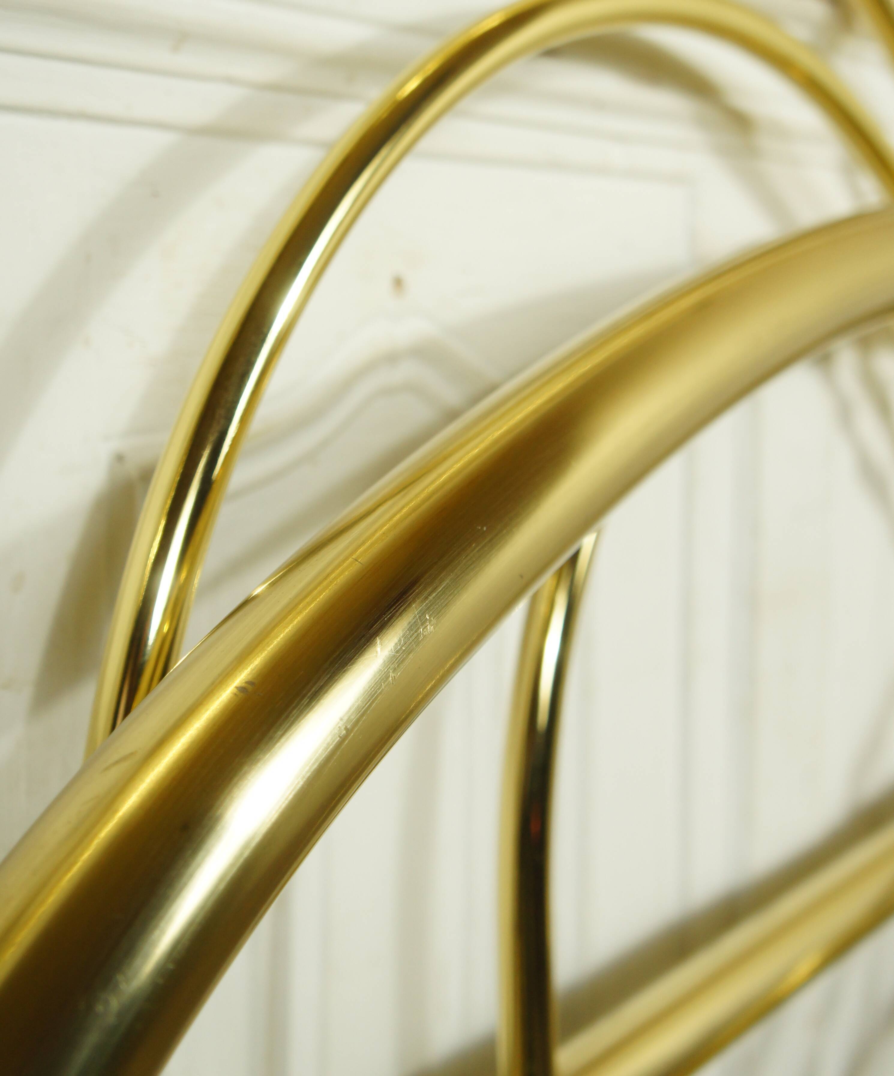 Hollywood Regency bed in gilded metal, circa 1970