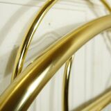 Hollywood Regency bed in gilded metal, circa 1970