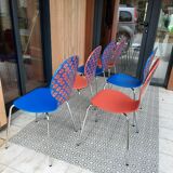 Blue and terracotta ant chairs with eye pattern