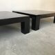 Paire de tables basses en bois laqué noir, circa 1970.