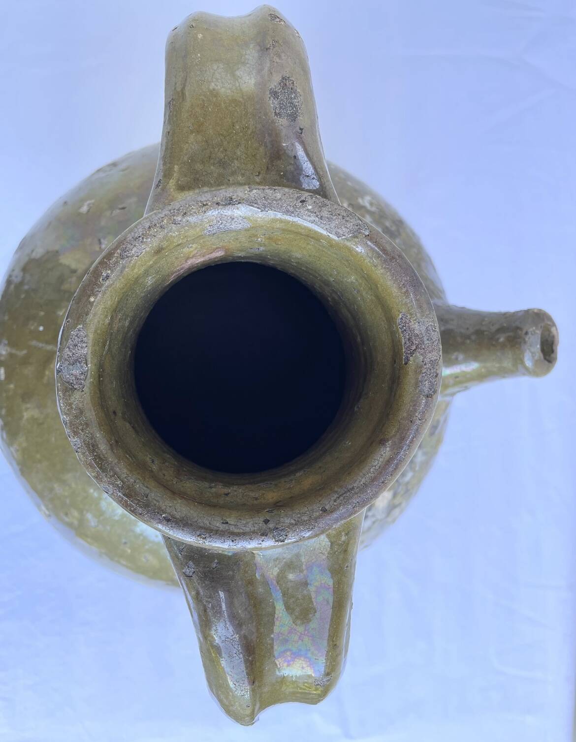 Ancient oil jar in glazed terracotta, khaki green — Auvergne, Lezou