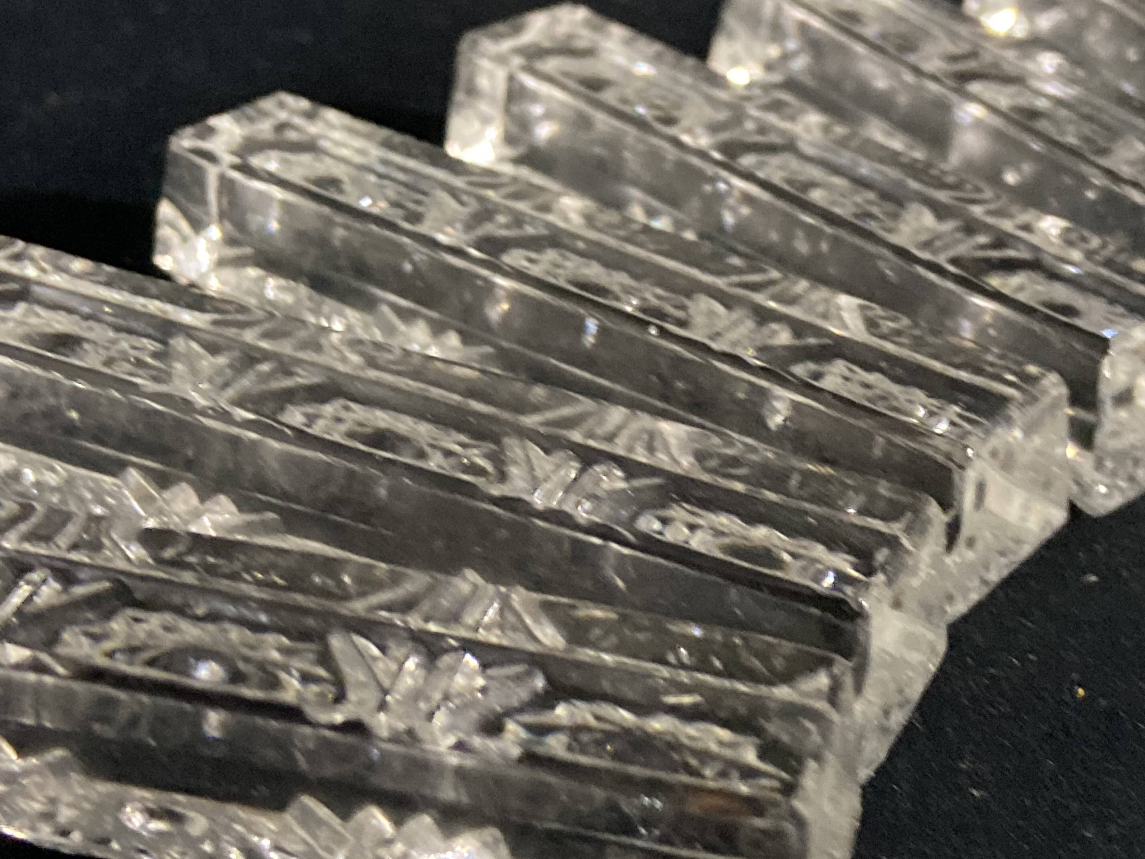 Set of 12 molded glass or crystal knife rests with diamond point decor