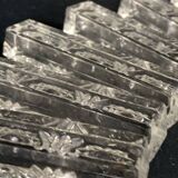 Set of 12 molded glass or crystal knife rests with diamond point decor