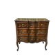 Carved and moulded solid wood commode in the Louis XV style.