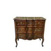 Carved and moulded solid wood commode in the Louis XV style.