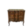Carved and moulded solid wood commode in the Louis XV style.