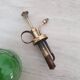 Ancien vaporisateur en laiton et verre
