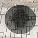 Round chrome coffee table with smoked glass