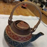 Old terracotta teapot