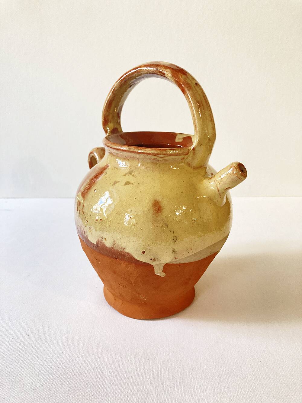 Antique Provençal jug / goat in red stoneware with yellow enamel