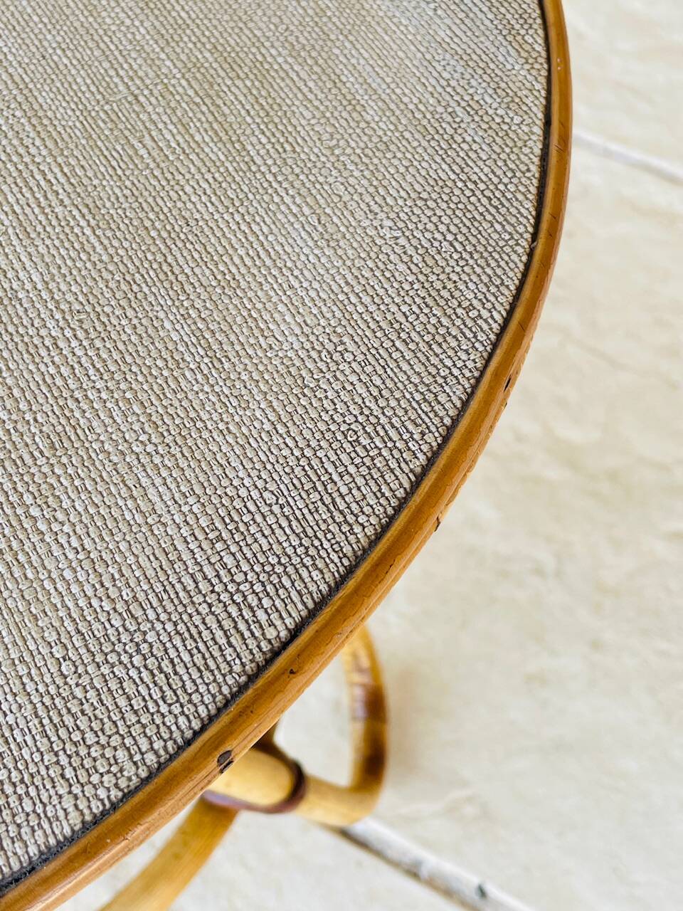 Vintage rattan and bamboo side table, circa 1969.