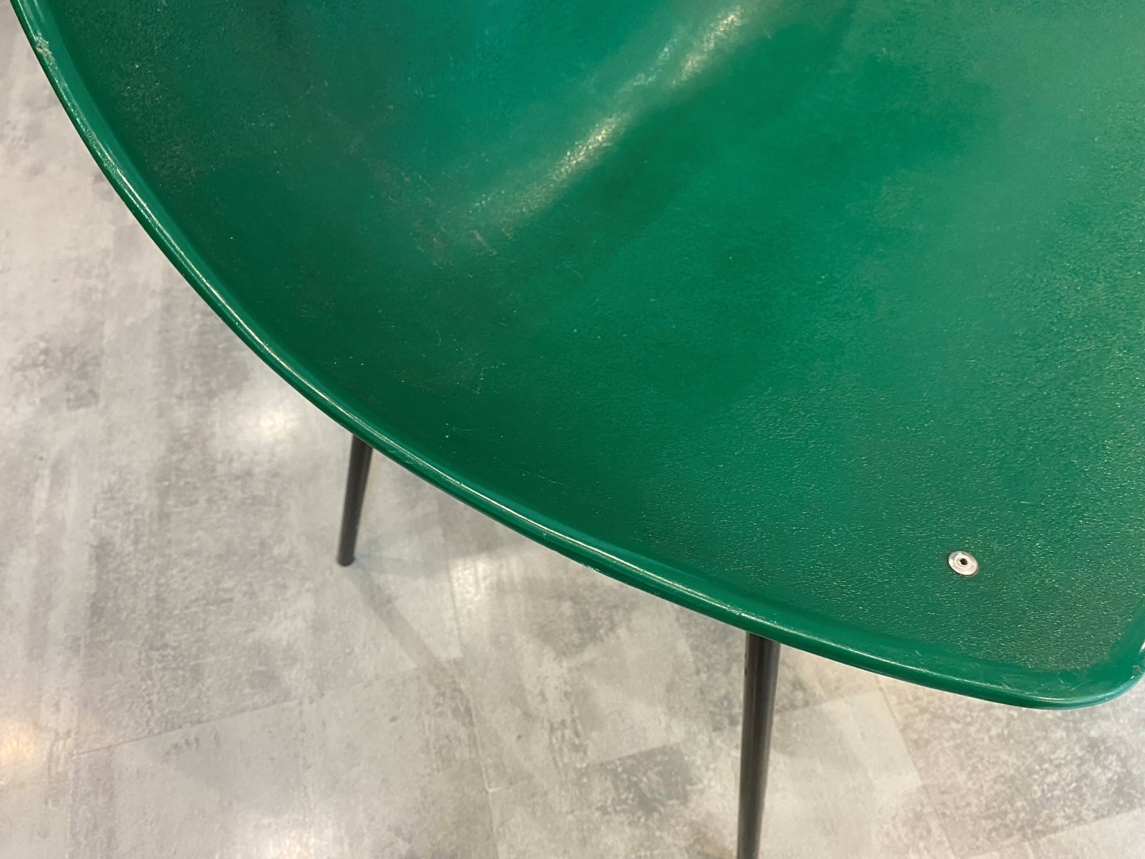 A shell chair by Pierre Guariche for Meurop in vintage green from the 1960s.