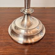 Vintage twisted chandelier with three lights in silver-plated metal.