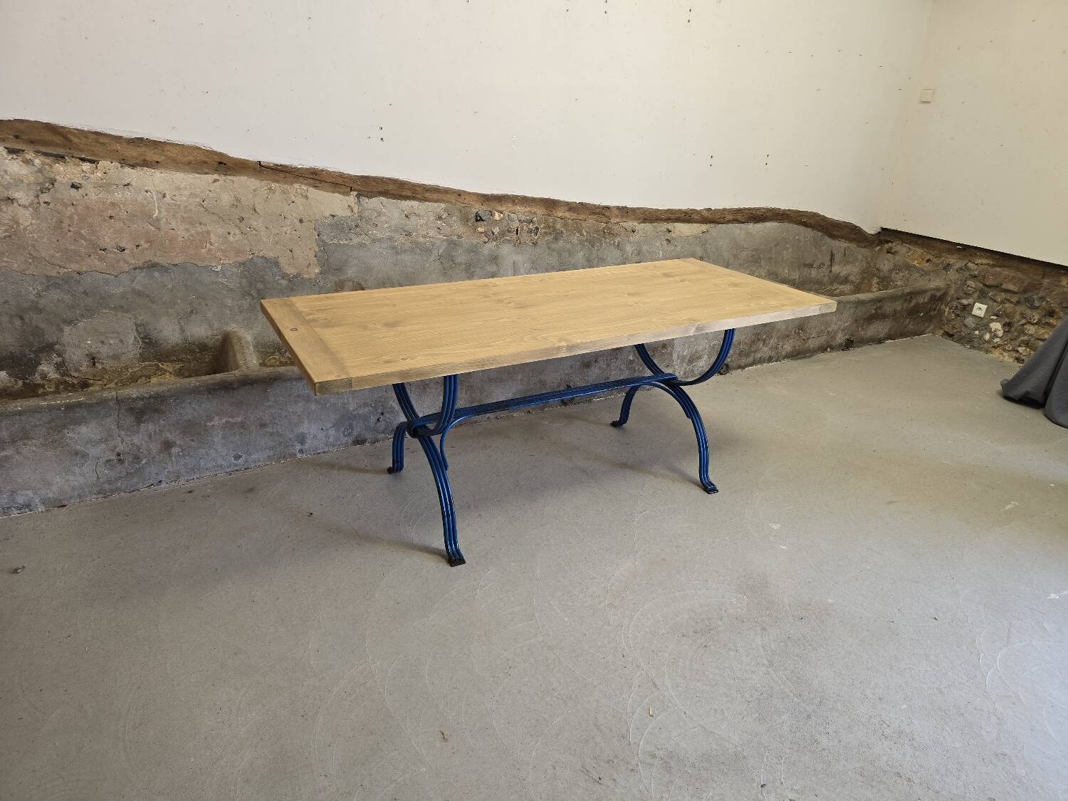 Wrought iron and solid wood table