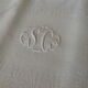 Nappe damassée et ses 12 serviettes brodé monogramme SC damas floral