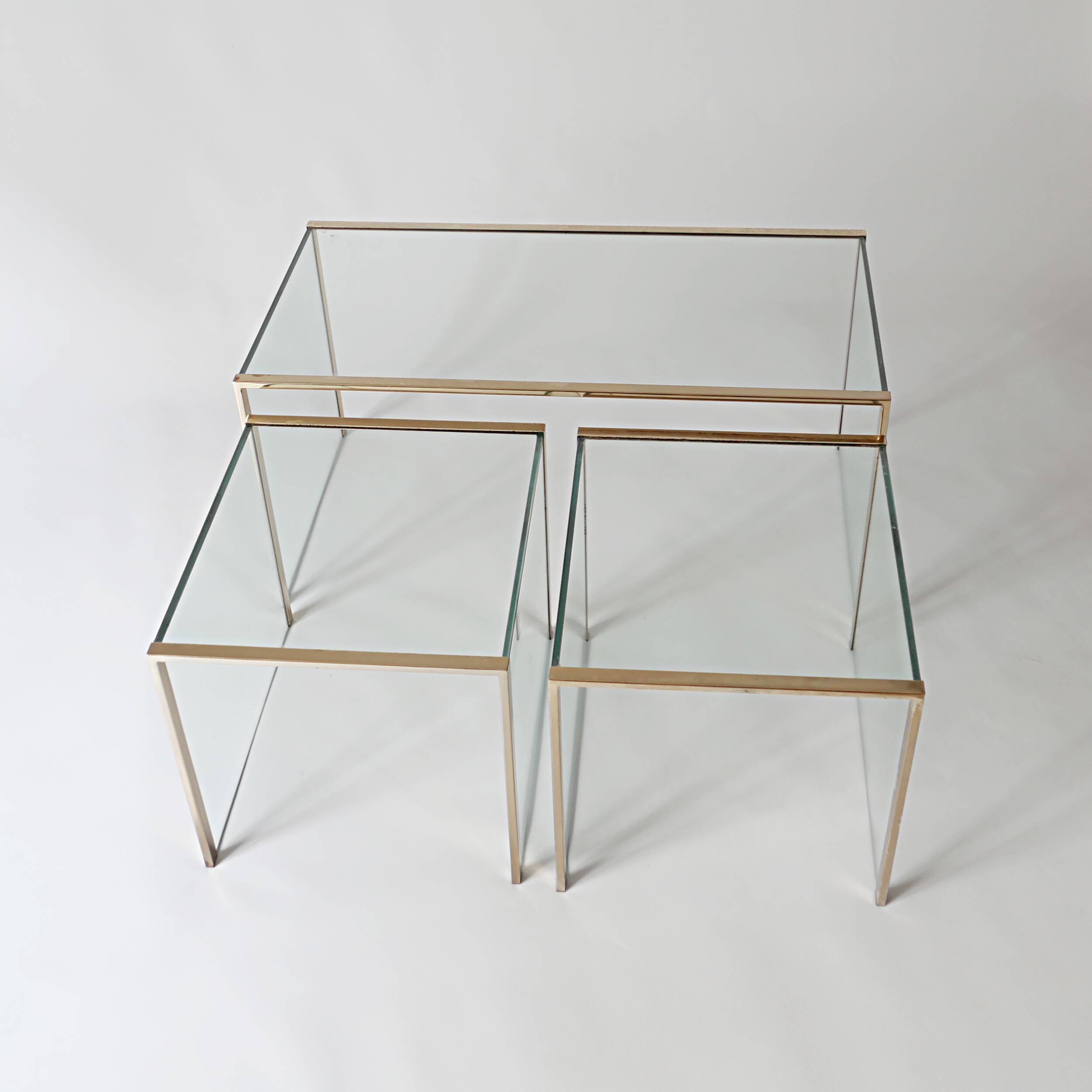 3 nesting coffee tables in glass and gilded metal, 1950-1970