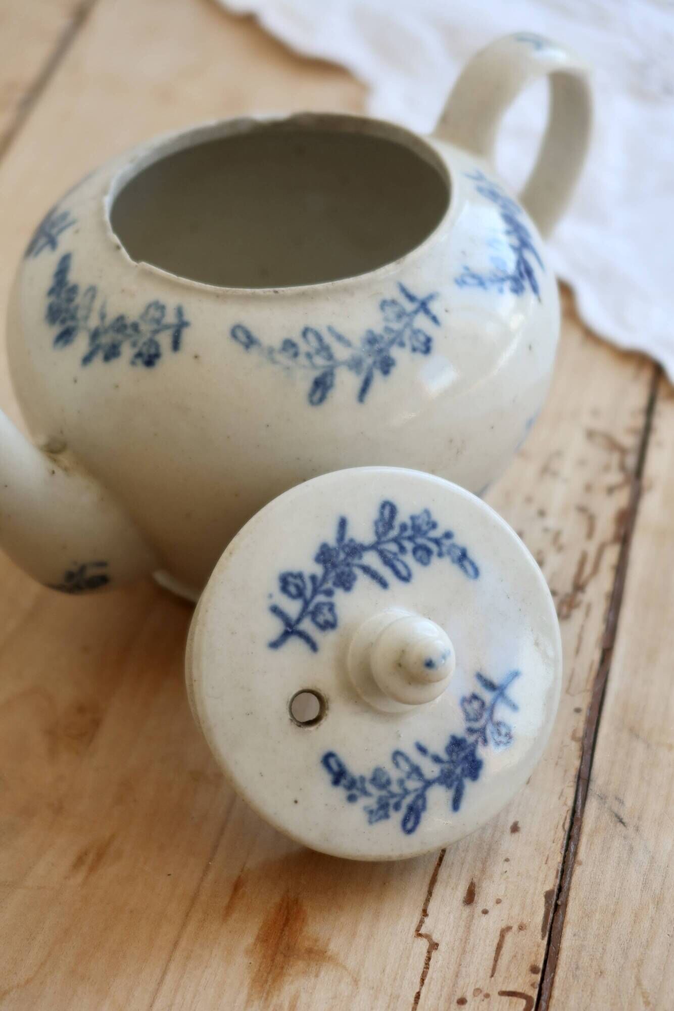 Antique teapot Saint-Uze steel clay with cobalt blue floral decoration.