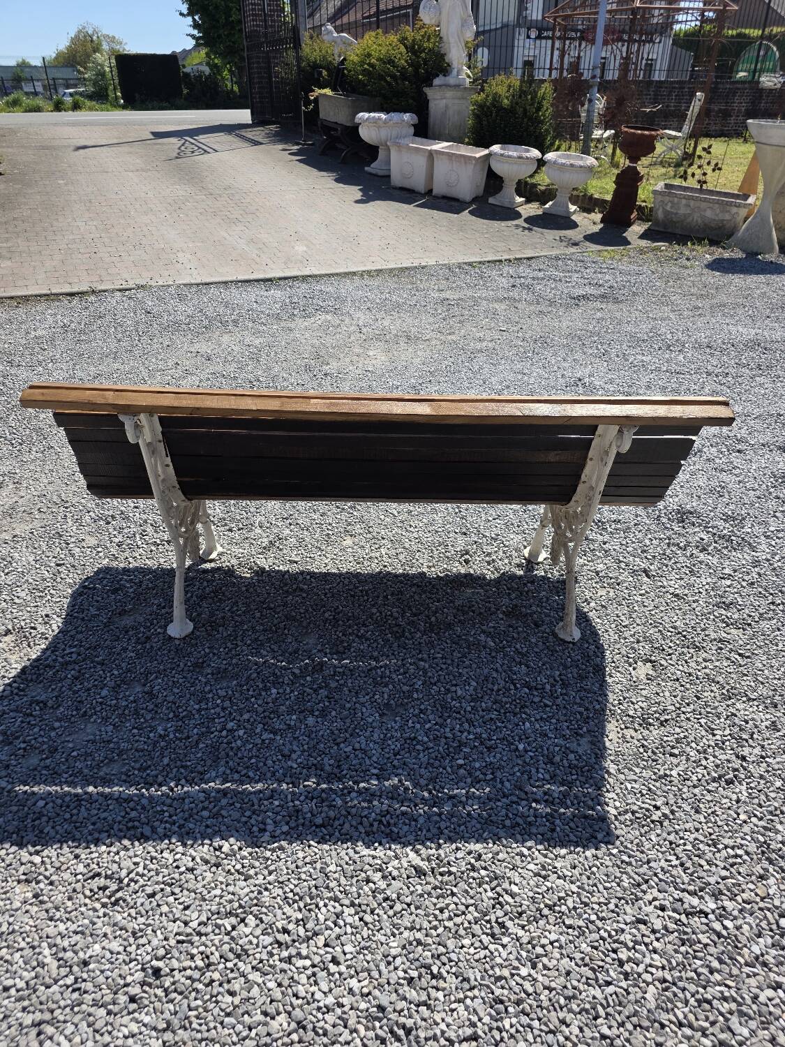 Antique garden bench made of cast iron and oak slats