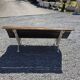 Antique garden bench made of cast iron and oak slats