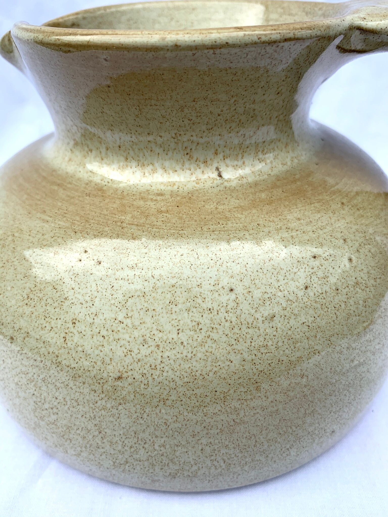 Vintage pitcher in enamelled sandstone