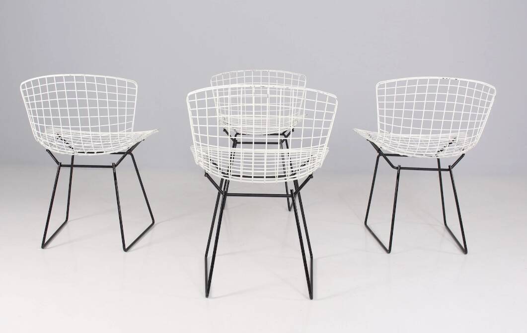 Set of 4 steel Harry Bertoia model 420 chairs