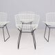 Set of 4 steel Harry Bertoia model 420 chairs