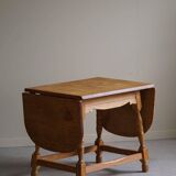 Danish mid-century folding side table in oak, Henning Kjærnulf, 1960s.