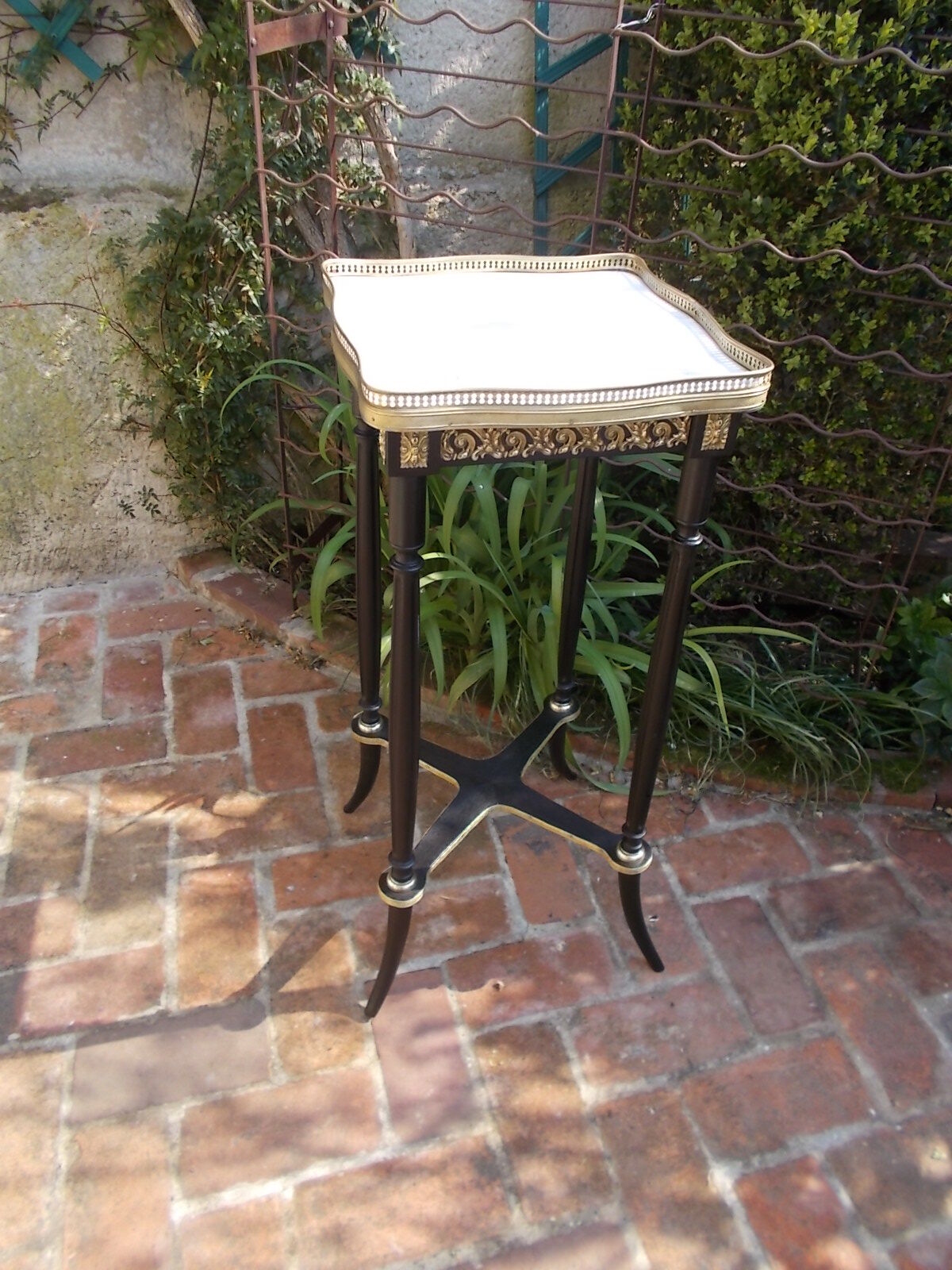 Napoleon III side table with marble top and openwork gallery.