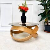 Smoked glass and curved wood coffee table