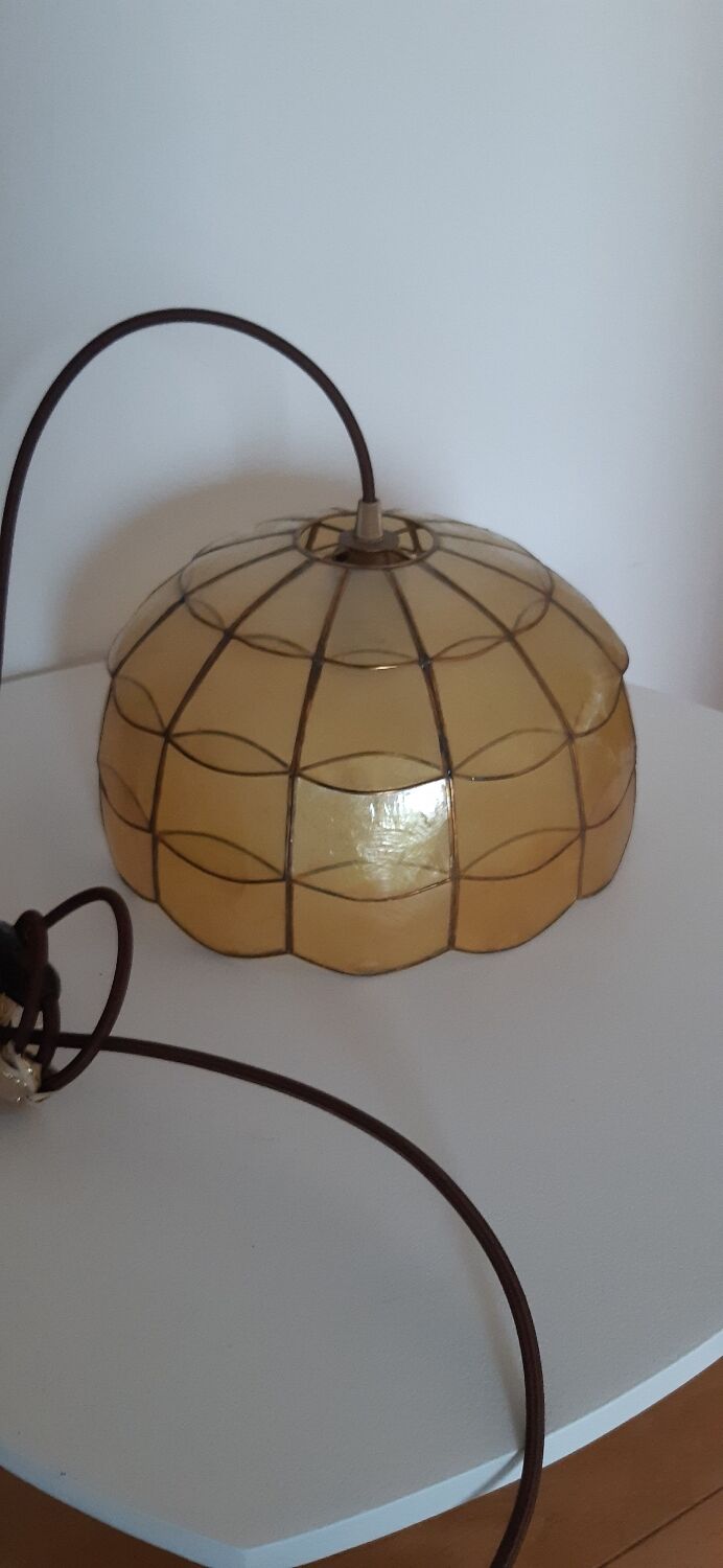 Mother-of-pearl and brass suspension