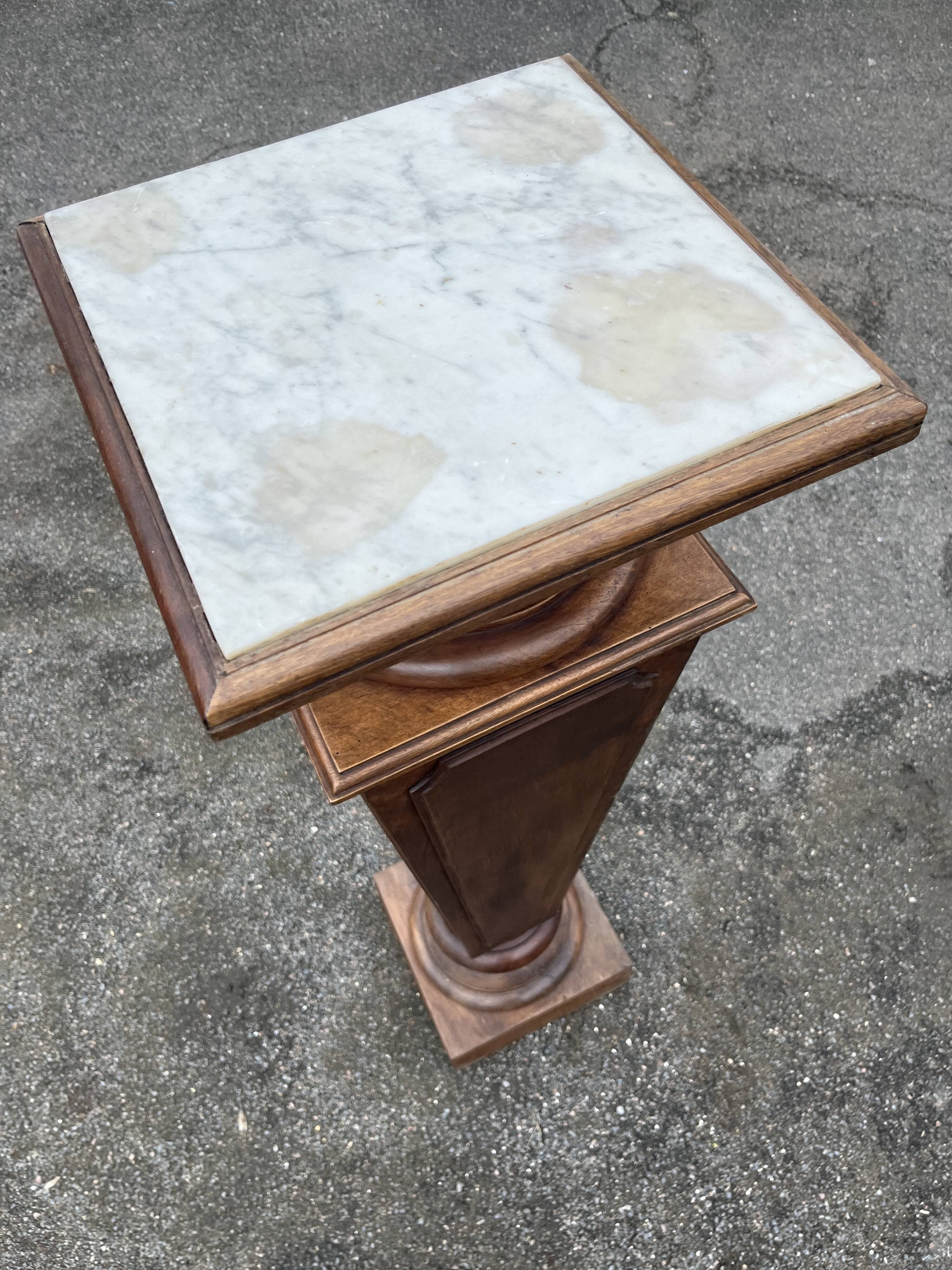 Large wooden and marble column/sheath