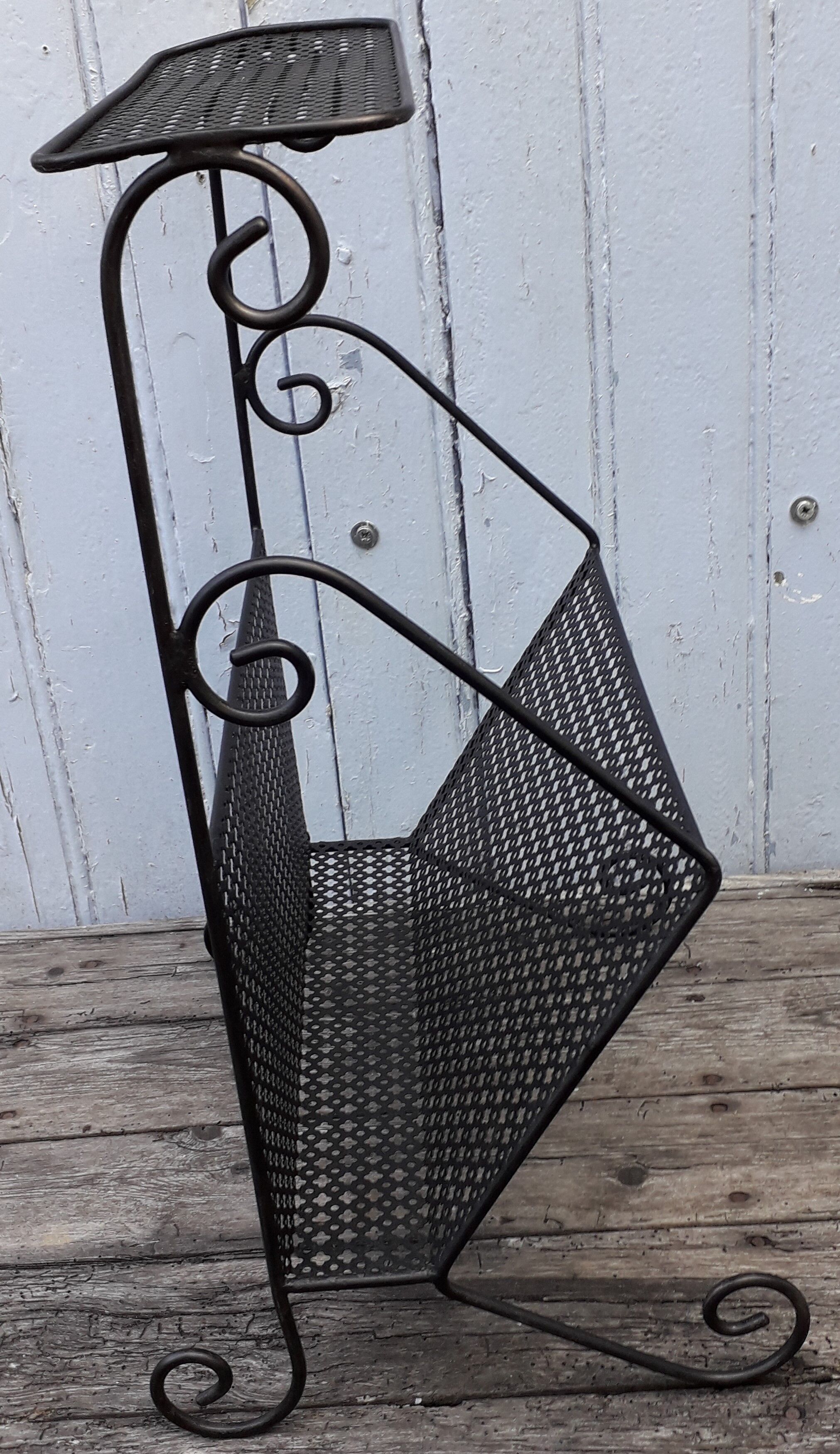 Metal magazine door