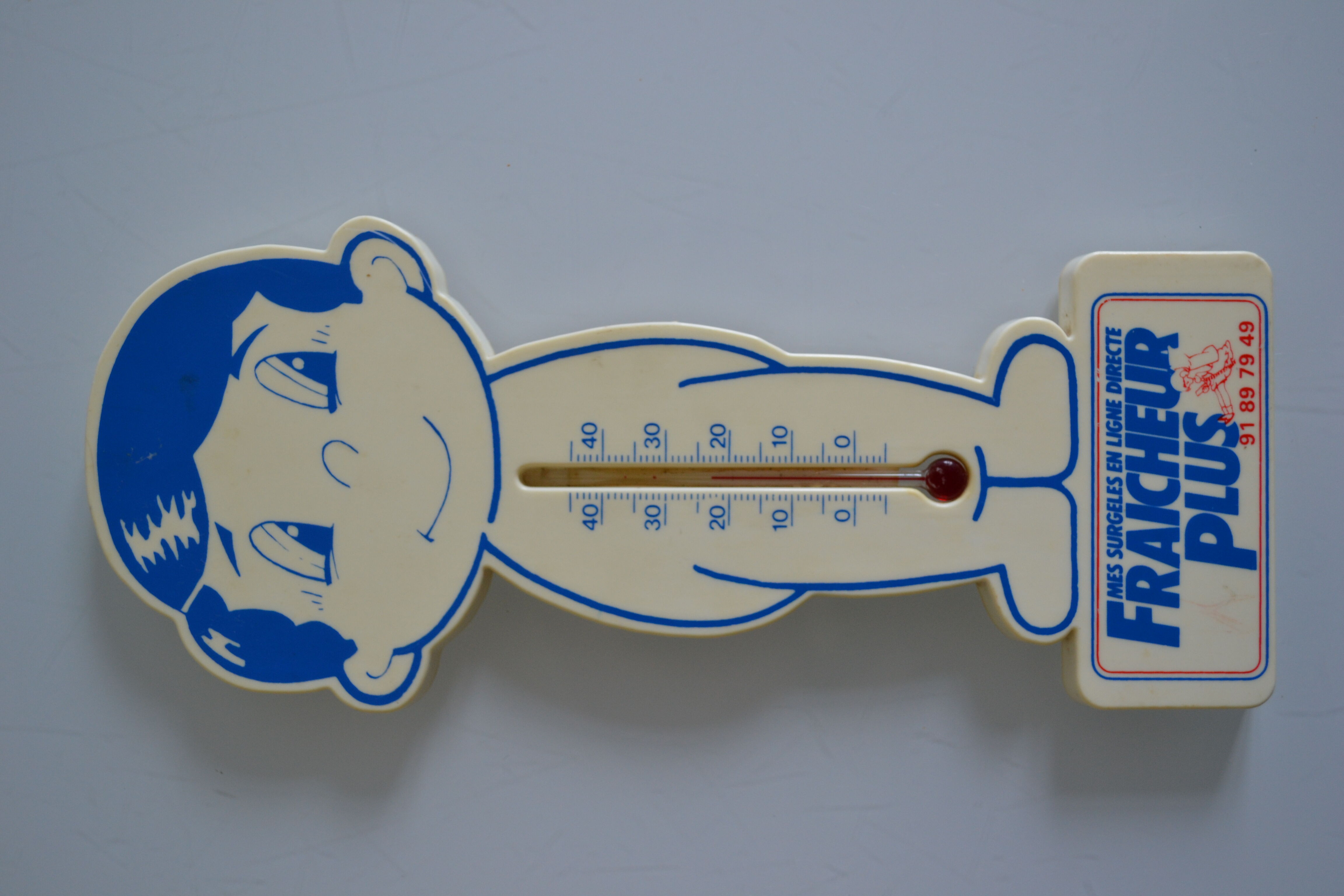 Vintage advertising thermometer