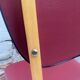 Chaise skaï rouge années 60