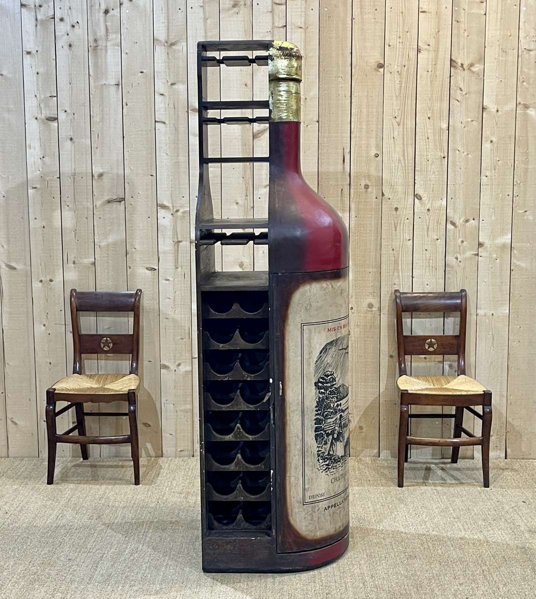 Advertising bar furniture in the shape of a giant wine bottle 90s