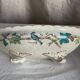 Oval jardinière in earthenware on legs with Japonese motif, birds, leaves.