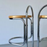 2 tabourets de bar tubulaires chromés et en rotin | Années 1970