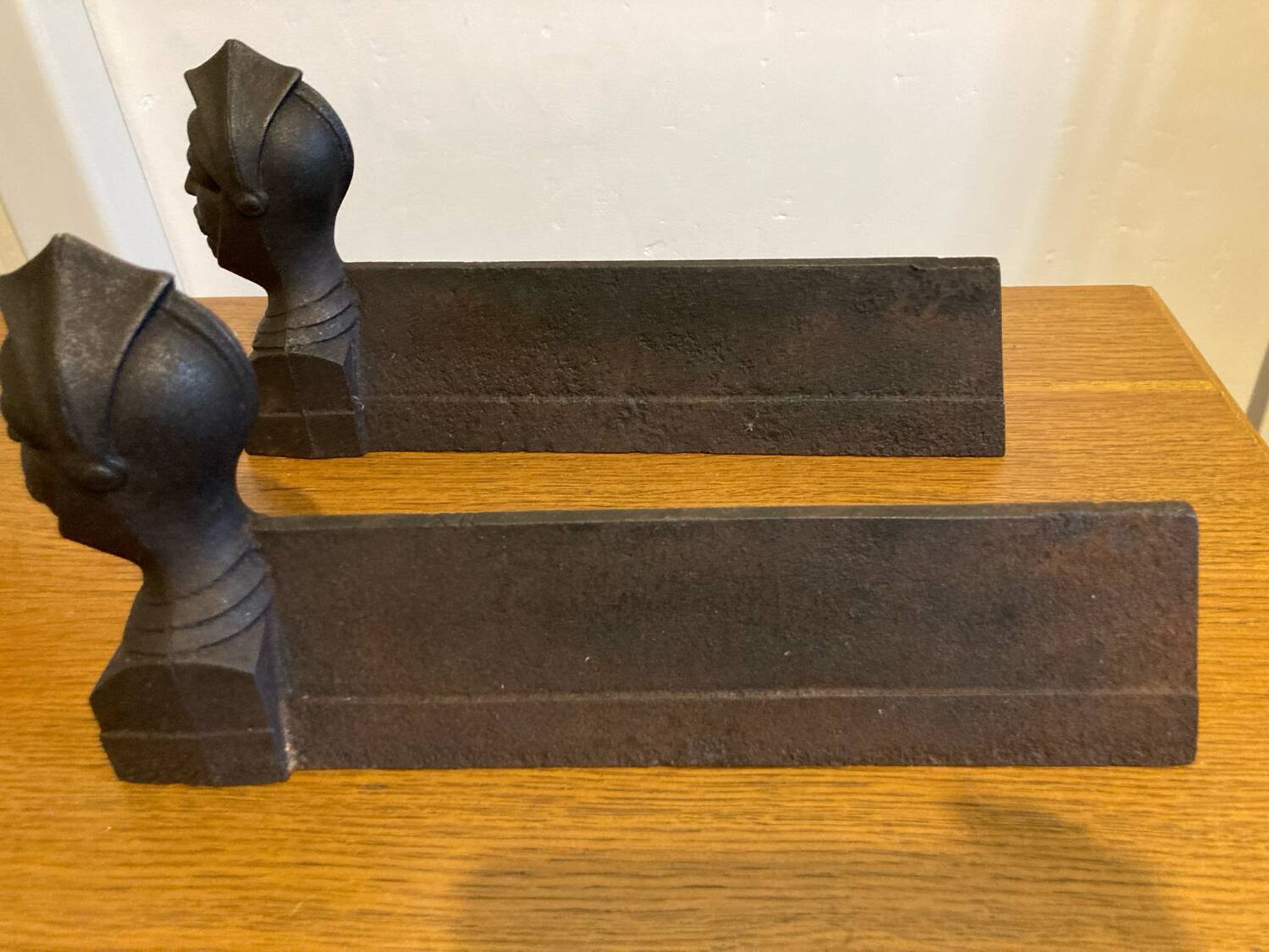 Pair of antique cast iron fire dogs