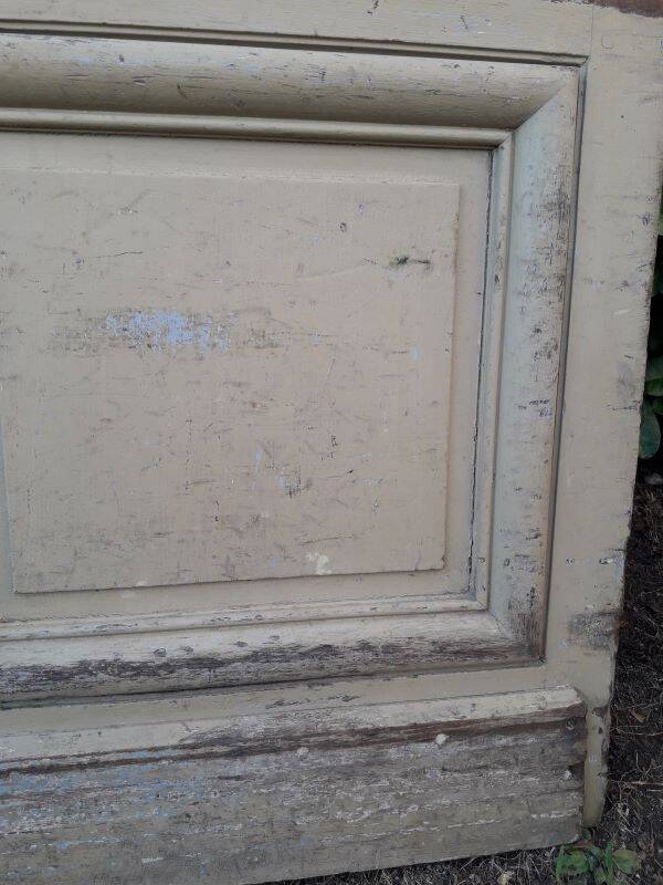 19th century double arched entrance door in oak with grilles and old glass