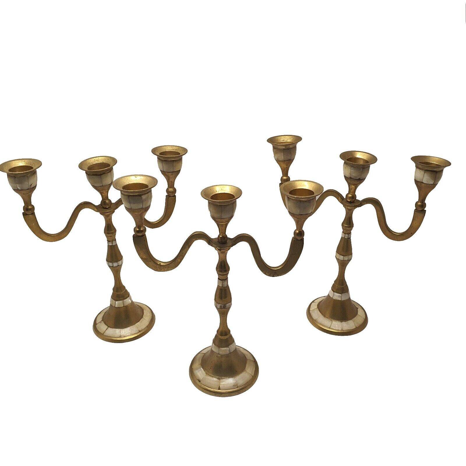 Set of 3-light brass candlesticks with mother-of-pearl intrusion