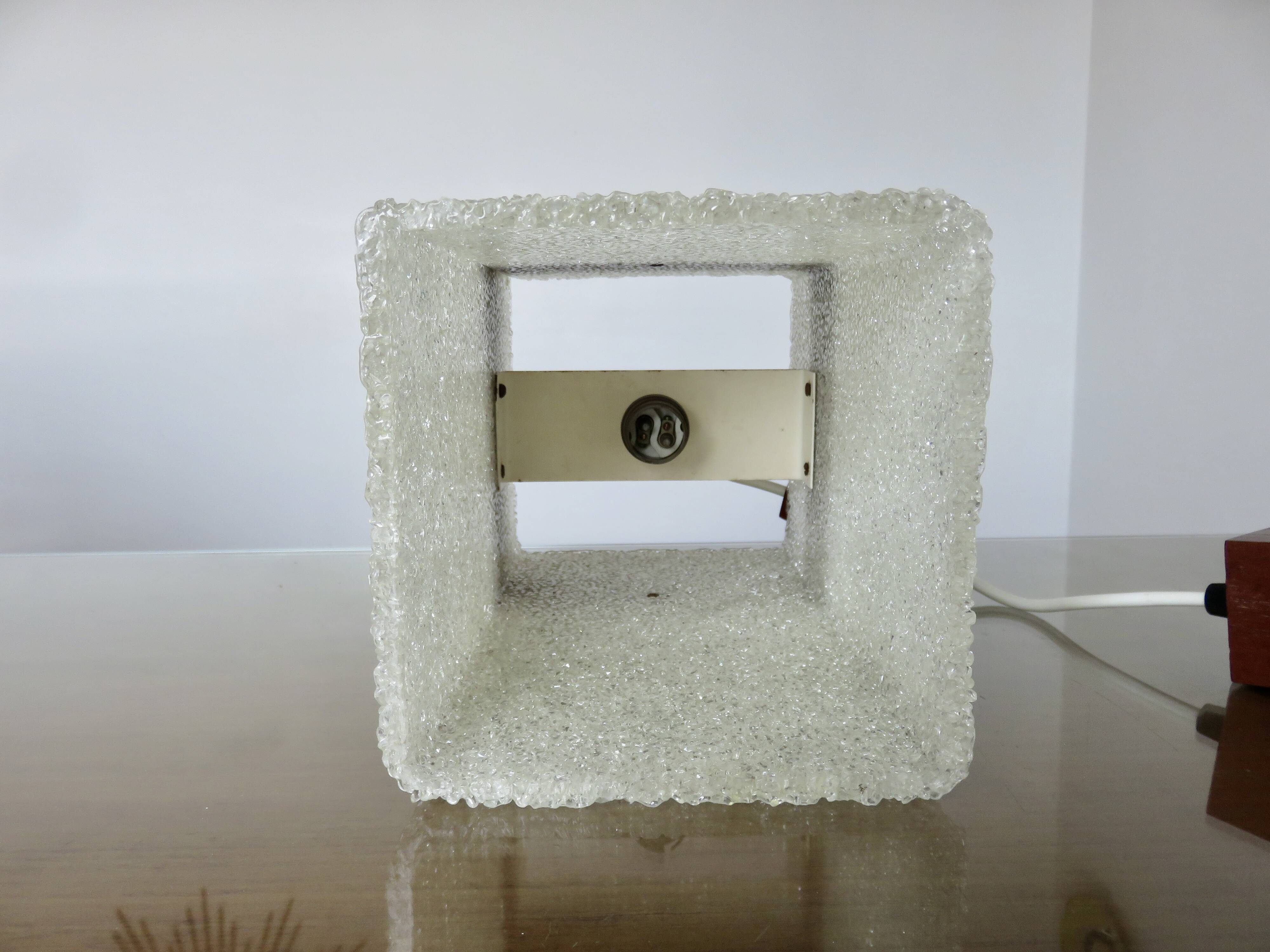 Pair of Scandinavian pendant lights in teak and perspex, 1970s.