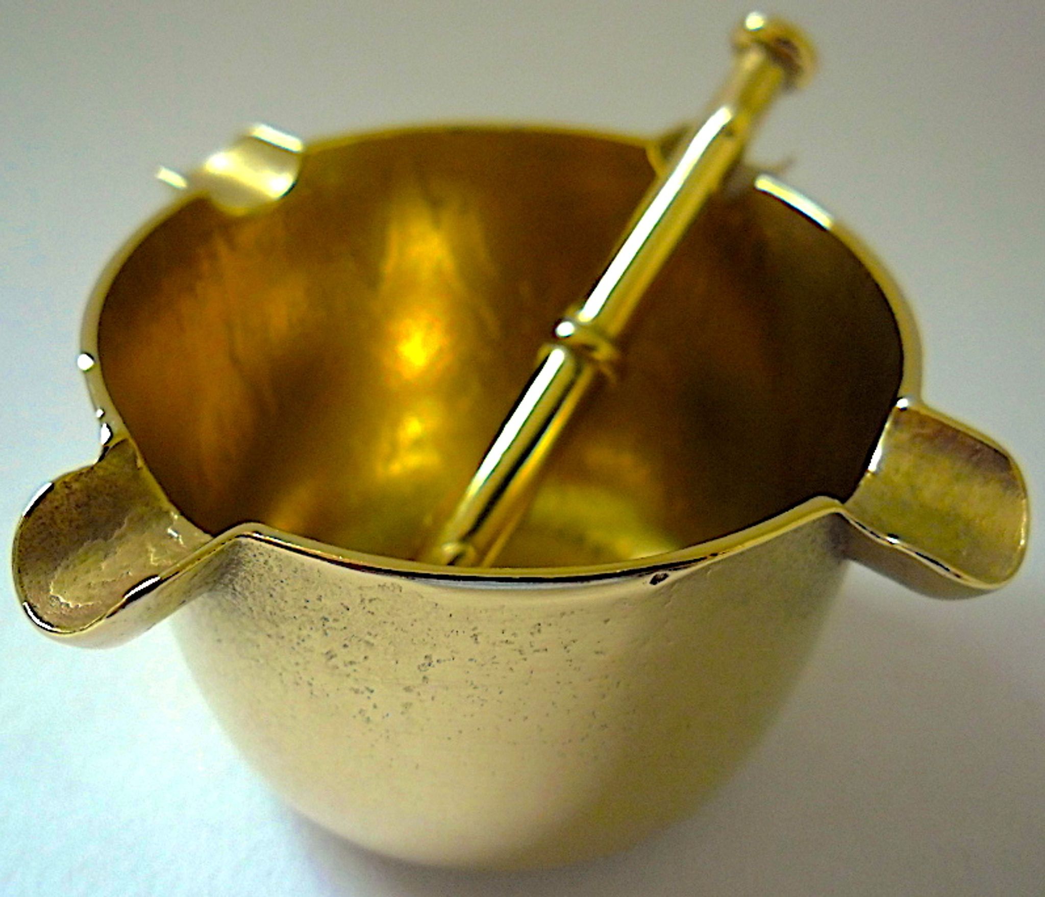 Three "vintage" bronze ashtrays with golden natural patina forming mortars with their drumsticks