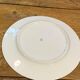 9 white porcelain plates of art deco blue flower limoges