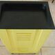 Vintage laundry basket in yellow and black plastic