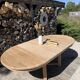 Round solid oak table with extensions, maximum 220cm.