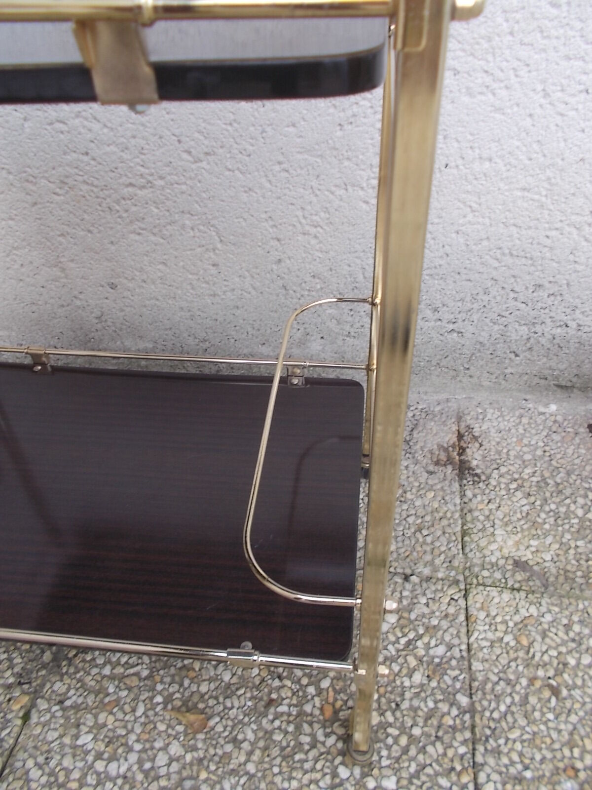 Rolling serving table in brass