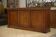 Mahogany workshop furniture with three sliding doors from the 1920s.