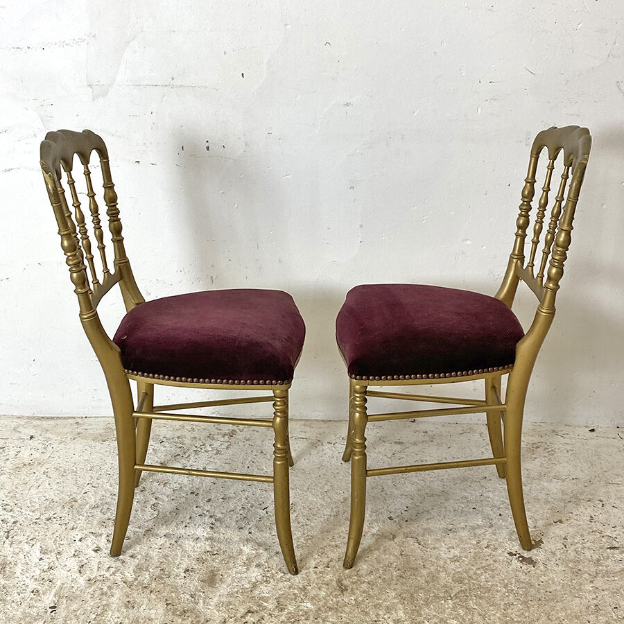Pair of Charivari chairs in gilded wood